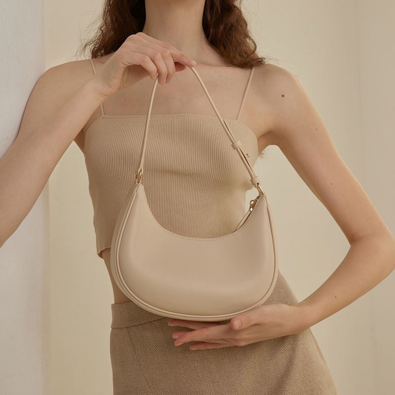 Sac à bandoulière minimaliste en forme de croissant